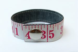 deep red upcycled measuring tape bracelets sewn handmade upcycled recycled repurposed