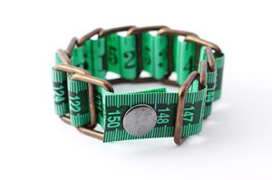 emerald green measuring tape bracelet upcycled reclaimed repurposed intertwined metal chains