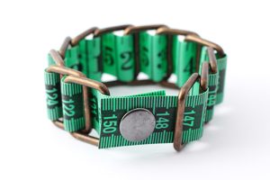 emerald green measuring tape bracelet upcycled reclaimed repurposed intertwined metal chains