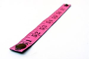 Fluorescent pink upcycled measuring tape bracelets sewn handmade upcycled recycled repurposed